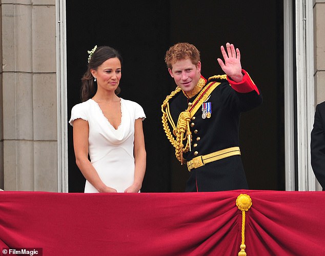 Harry waves at onlookers. Both Kate and Harry shed tears together at the end of the wedding