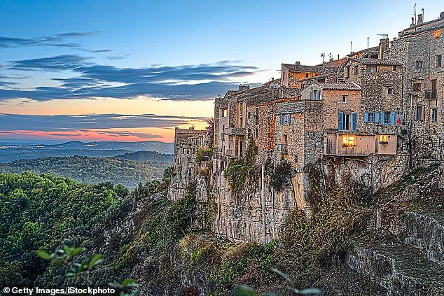 The village of Tourrettes-Sur-Loup clings to a cliff above the riviera