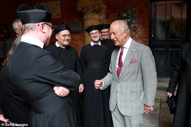 The monarch appeared delighted to meet members of the religious community based at Birmingham Oratory