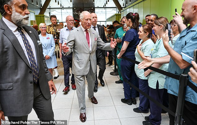 Charles greeted hospital staff and received a warm response from the crowds