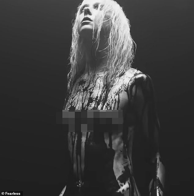 The Pretty Reckless frontwoman Taylor Momsen went fully nude, aside from black body paint, for the music video for her hard rock band's first single in four years, For I Am Death