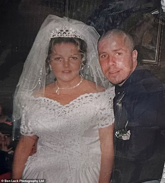 Mr Collins was on holiday in Mallorca to celebrate his wife's birthday in July 2020 when he collapsed and died aged 49. PIctured: Michael and Kathleen's wedding picture