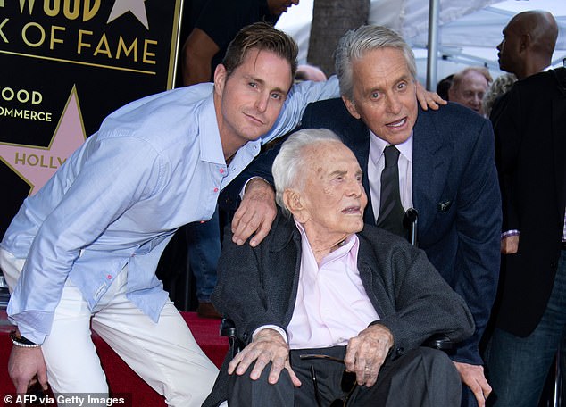 Cameron's dad Michael assumed blame, calling himself 'a bad father' and said without being sent to prison, his son would 'be dead' (Cameron, Michael and Kirk Douglas seen in 2018)