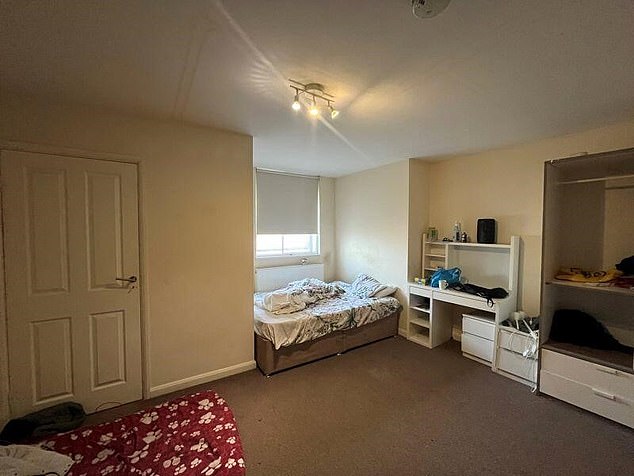 A bedroom inside the Mears-run HMO, which features a large wardrobe, desk and double bed