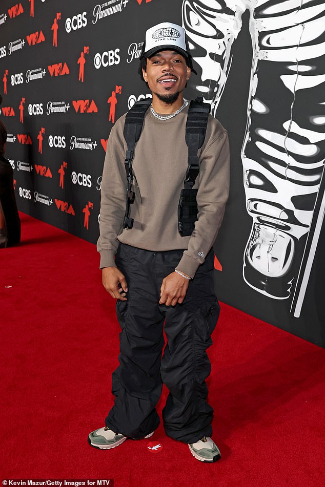 Chance the Rapper walked the carpet in a brown sweater, baggy pants, sneakers, and a vest, but it looked like he was dressed for the outdoors rather than a star-studded event