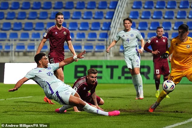 Che Adams opens the scoring for Scotland just before half-time against Belarus