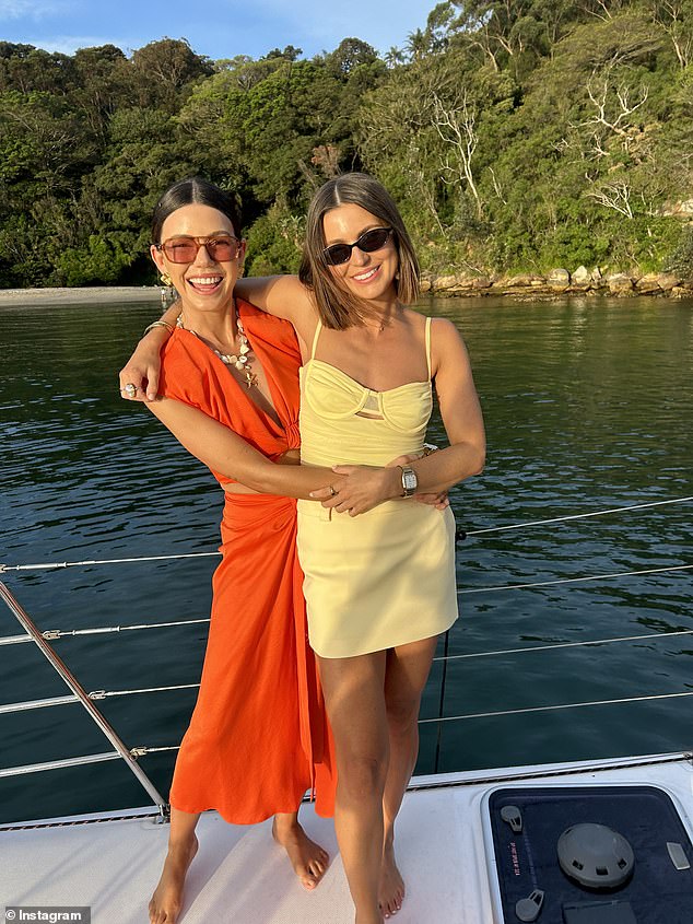 Lauren (left), pictured with her sister Lisa (right), says she had the kind of life that looked perfect 'on paper' - until she started experiencing a worrying health symptom in her late 20s