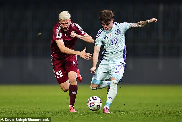 Vadim Pigas (left) was brought on at half-time to try to contain Gannon Doak