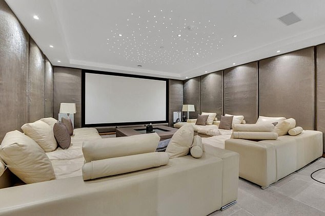 It also has a glamorous cinema room which looks perfect for cosy movie nights with the family