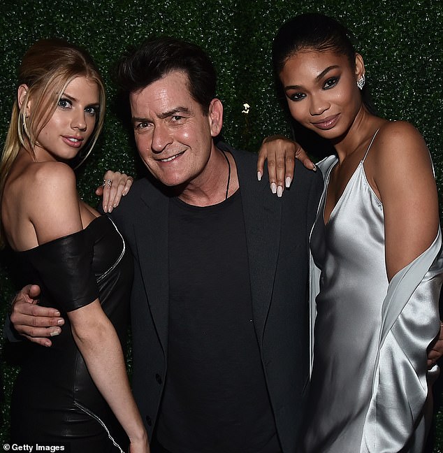 Charlie Sheen with co-stars Charlotte McKinney, left, and Chanel Iman at the 2017 premiere for Mad Families