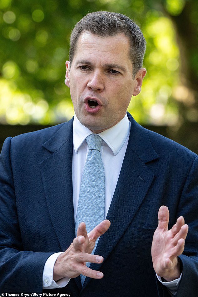 Tory justice spokesman Robert Jenrick (pictured) said: 'The small boats are a national security emergency, but Starmer's Attorney General is blocking the bold action needed to fix it'