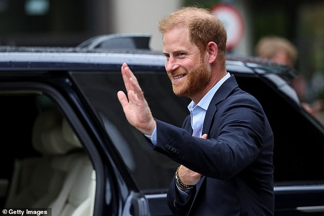 Prince Harry, Duke of Sussex waves as he departs following a visit to the Centre for Blast Injury Studies at Imperial College London this week on his pseudo-royal tour