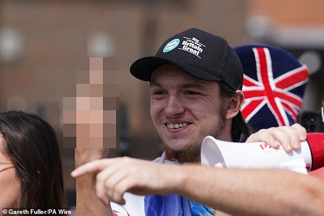 One woman said of her concerns: ''It is terrible that we cannot look after our own when the Government are paying the bills and the wrong people are coming in' (pictured: an anti-immigration protester in Horley last month)