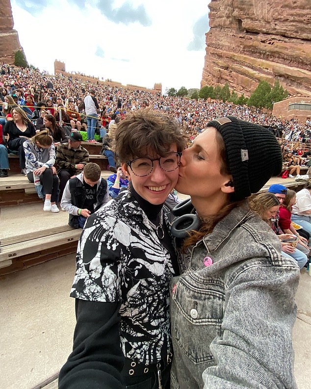 Wolfe, pictured with her partner in 2024, became the first openly transgender athlete to qualify for the Olympics for the United States back in 2021 at the Tokyo games