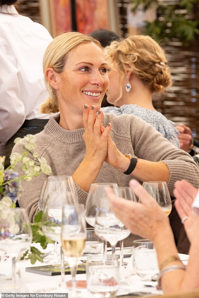 Later, the mother-of-three swapped into a beige jumper to match her taupe manicure, opting for a fresh-faced make-up look and keeping her blonde tresses back in a ponytail