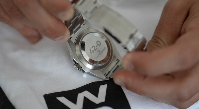 The watch was engraved with '42-0' - a defiant message of confidence delivered on the eve of his historic clash with Canelo Alvarez