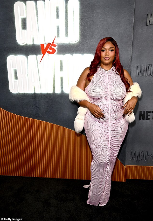 Lizzo continued to flaunt her incredible weight loss on Saturday night as she joined fellow A-list stars at the Canelo v Crawford fight event at Allegiant Stadium in Las Vegas