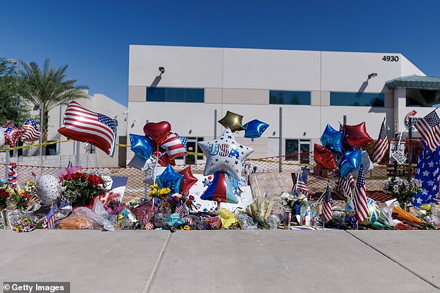 There has been an outpouring of grief with flowers, balloons and notes left at a memorial for Charlie Kirk at the headquarters of Turning Point USA