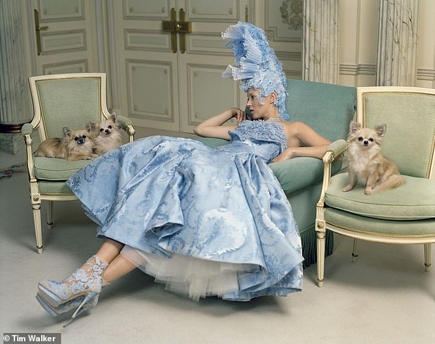 Among the exhibits is a 2012 photograph of Kate Moss, styled by Sarah Burton for Alexander McQueen, posing as France's last Queen, with a trio of chihuahuas around her, at The Ritz in Paris