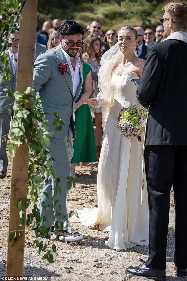 She looked sensational while marrying her trainer-clad partner