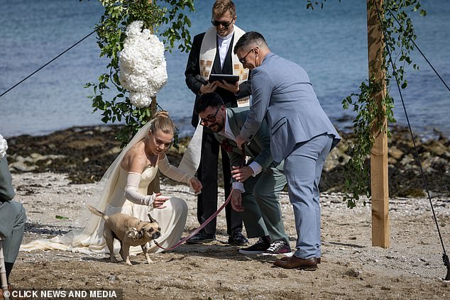 The couple ensured their pet pooch was part of the ceremony