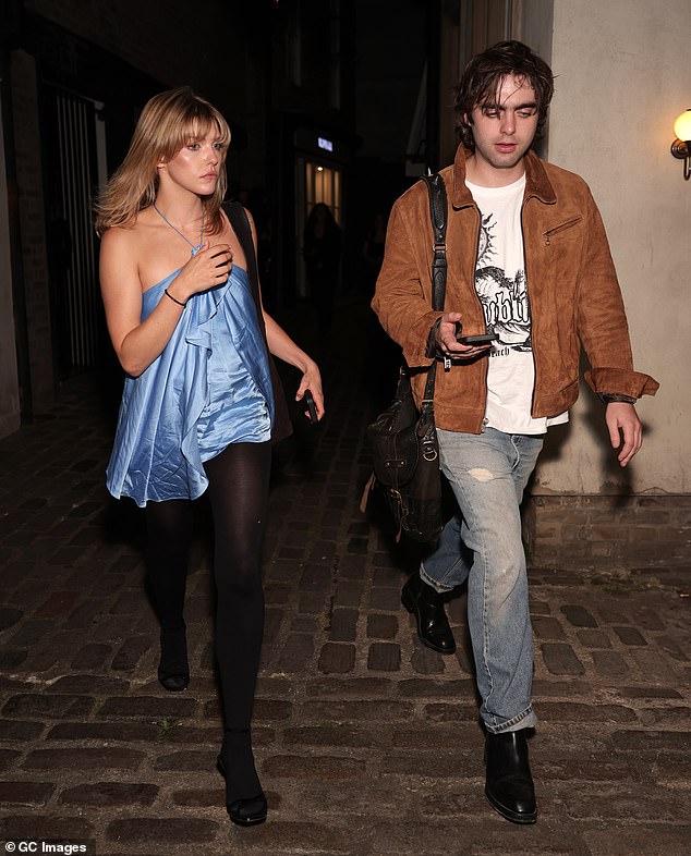 The blonde beauty looked gorgeous in a tiny blue mini dress