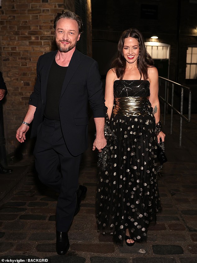 While he cut a dapper figure in a navy suit she wore an eye-catching metallic dress
