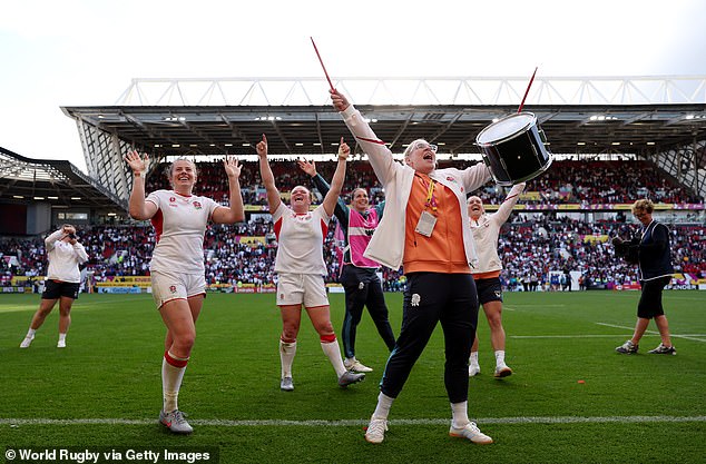 England's players celebrate reaching a second consecutive Women's Rugby World Cup final