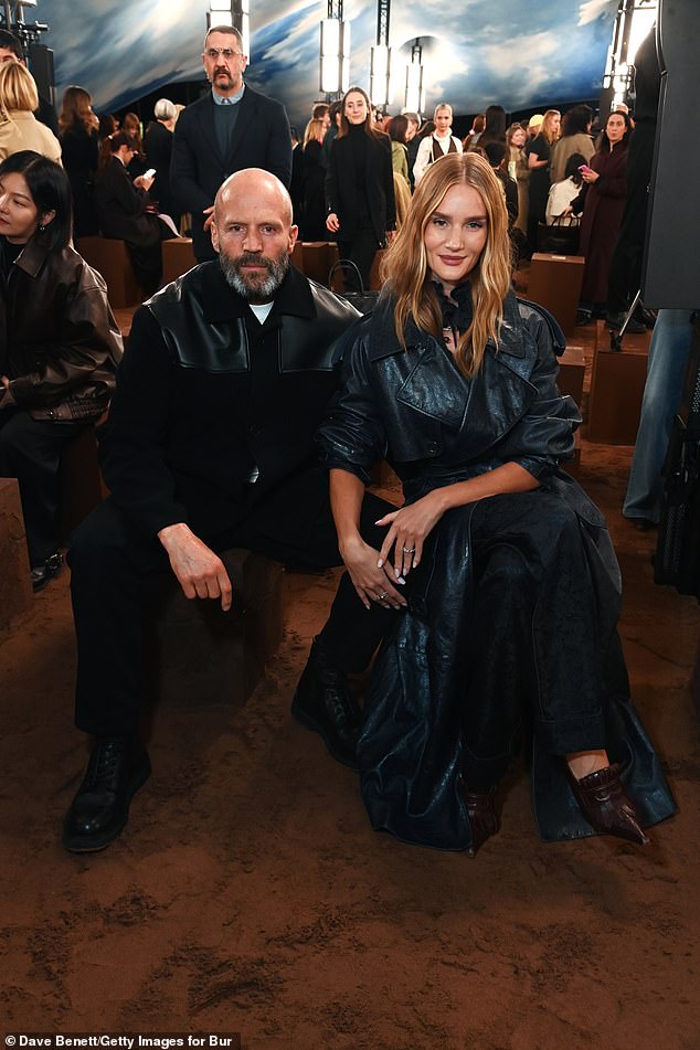 The supermodel and the Snatch star cosied up to one another as they joined A-listers at the runway event