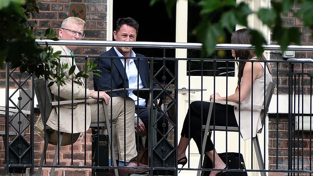 Charles and Harry's senior aides held a secret peace summit in London in July. Present were Tobyn Andreae, the King’s communications secretary (left); Meredith Maines, head of communications for the Sussexes (right); and Liam Maguire, who runs the Sussexes' PR team in the UK (centre)