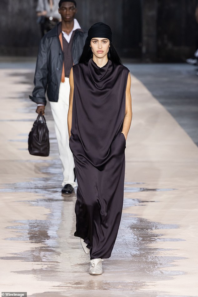 And on Thursday, she even strutted the catwalk for BOSS' Spring/Summer 2026 collection, with Romeo's dad David Beckham sat in the front row (pictured)