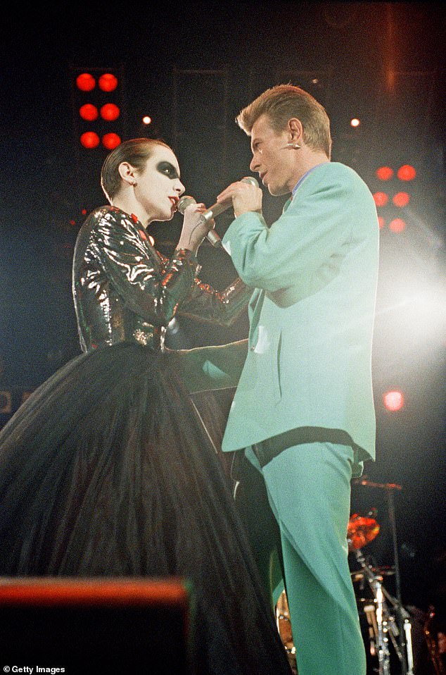 Discussing her and David Bowie's androgynous looks, Annie said: 'The clothes gave us an identity. I guess we all have a sense of style' (pictured in 1992)