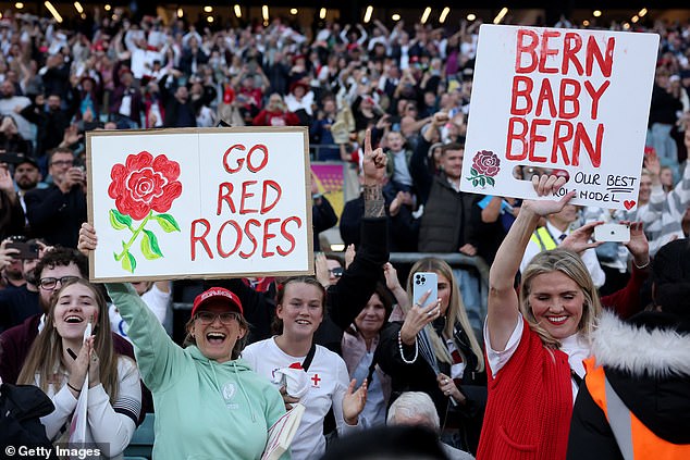 England fans show their support as they hold handmade signs during the final