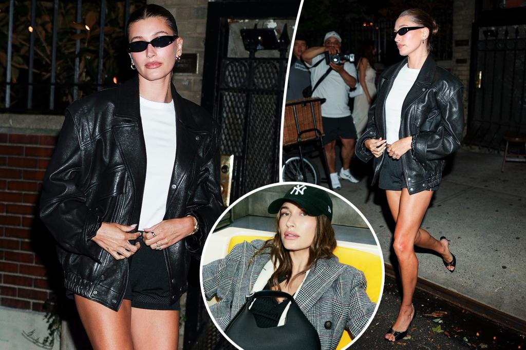 Hailey Bieber wears leather bomber and tiny mesh basketball shorts in NYC