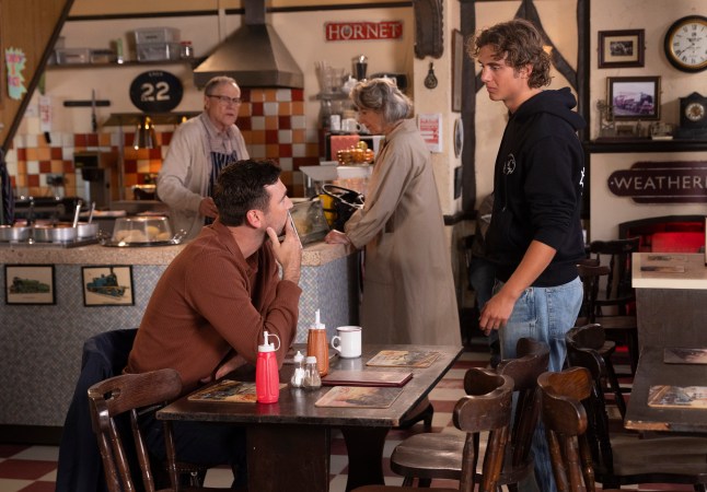 Kit questions Brody in Roy's Rolls in Coronation Street