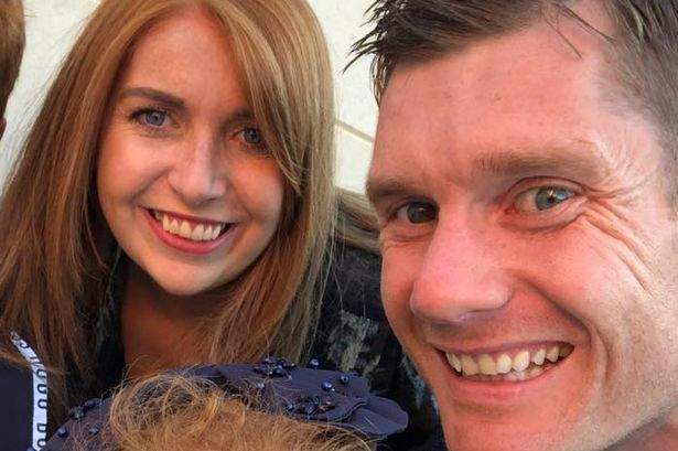 Michael McGovern with his wife Leanne and children