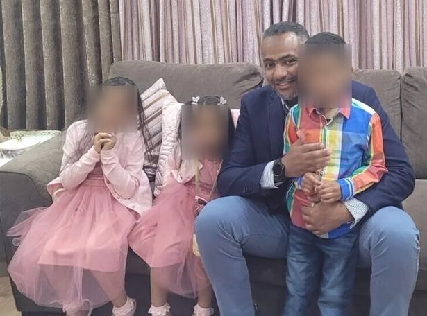 Ahmed al-Doush with three of his children. A fourth has been born since he was held in custody in Saudi Arabia. 