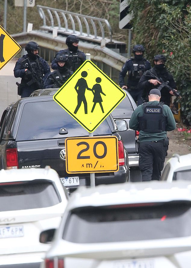 02 SEPT 2025 SYDNEY NSWWWW.MATRIXNEWS.COM.AUCREDIT: MATRIXNEWS FOR DAILYMAIL AUSTRALIAASSIGNMENT:  DAY 8 IN HUNT FOR DEZI FREEMANAs Vic Police set up their information kiosk in Bright pleading for public information to help in the hunt for Dezi Freeman, tactical officers and the police chopper are seen once again scouring the area of Dezi Freeman's Rayner Track property.