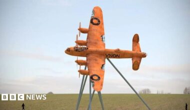 Artist impression of a rust-coloured Lancaster bomber on a metal stand with a field in the background.