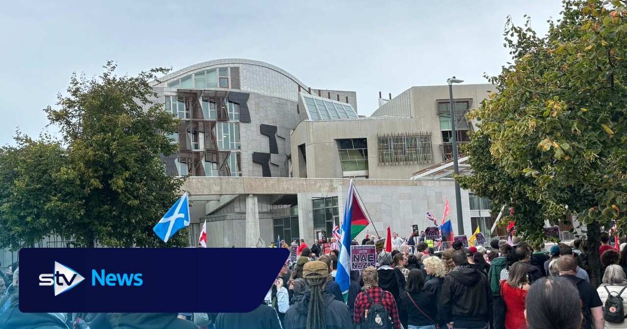 Protesters defy police warnings with signs supporting Palestine Action