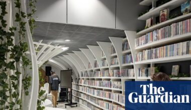 Warsaw opens metro station ‘express’ library to get commuters off their phones | Poland