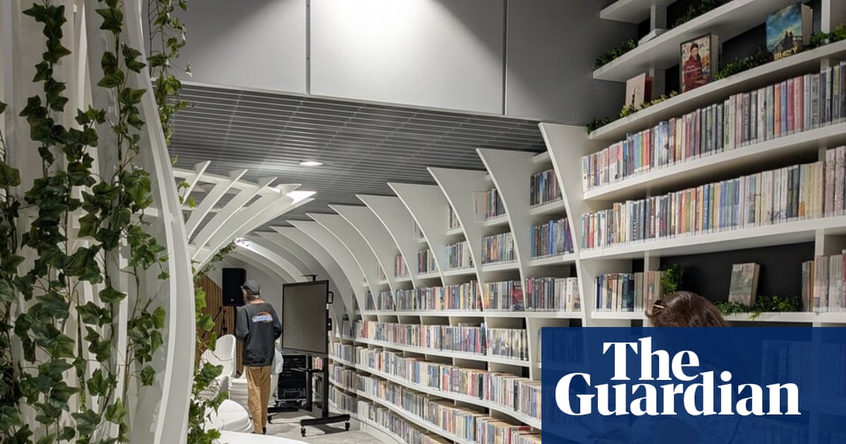 Warsaw opens metro station ‘express’ library to get commuters off their phones | Poland