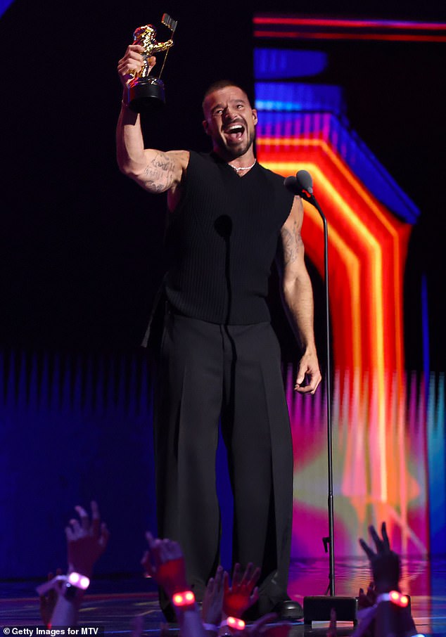 ELMONT, NEW YORK - SEPTEMBER 07: Ricky Martin accepts the "Latin Icon Award" during the 2025 MTV Video Music Awards at UBS Arena on September 07, 2025 in Elmont, New York. (Photo by Arturo Holmes/Getty Images for MTV)