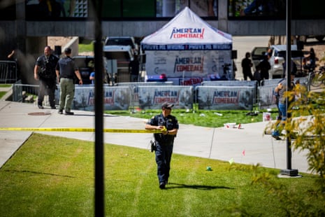Law enforcement tapes off an area after Charlie Kirk was fatally shot on the Utah Valley University campus on Wednesday.