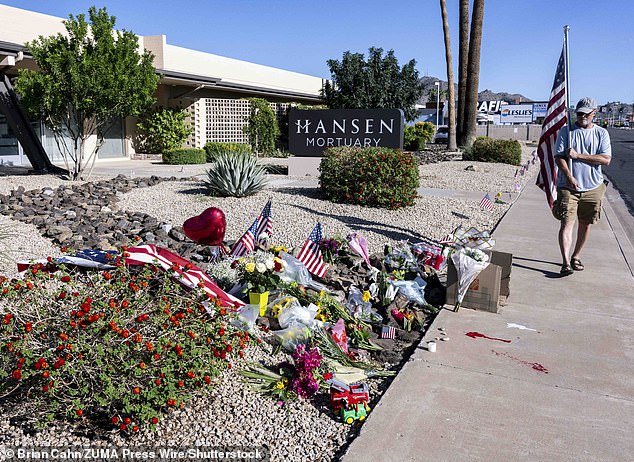 Mandatory Credit: Photo by Brian Cahn/ZUMA Press Wire/Shutterstock (15483583h) September 12,, 2025 - Phoenix, Arizona, USA - A makeshift memorial - including a splatter of fake blood - at the Hansen Mortuary Chapel, which is handling the funeral arrangements for Charlie Kirk. The founder of Turning Point USA was assassinated two days ago in Orem, Utah. Memorial At Charlie Kirk'S Mortuary, Phoenix, Arizona, USA - 12 Sep 2025