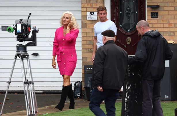 Nikki Shadwick and Philip Olivier on set in Brookside