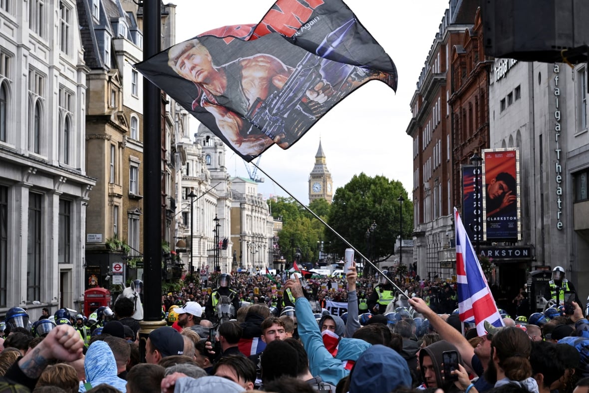 Protesters wave flags during a march.