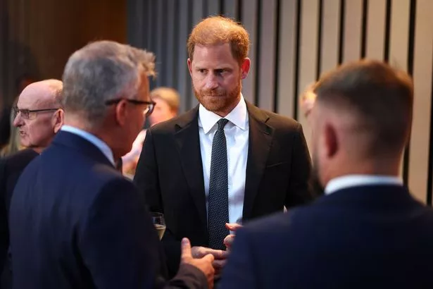 Prince Harry during an event for the Invictus Games last night after his meeting with the King