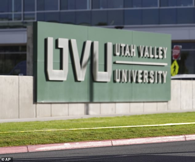Meagan Bradley walks to a memorial for Charlie Kirk at Utah Valley University in Orem, Utah, Friday, Sept. 12, 2025. (AP Photo/Lindsey Wasson)