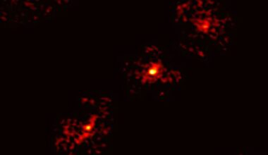 Astronomers discover rare Einstein cross with a fifth image, revealing hidden dark matter